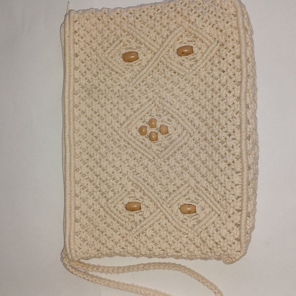 Macrame cream Wristlet clutch with wooden beads details beach
